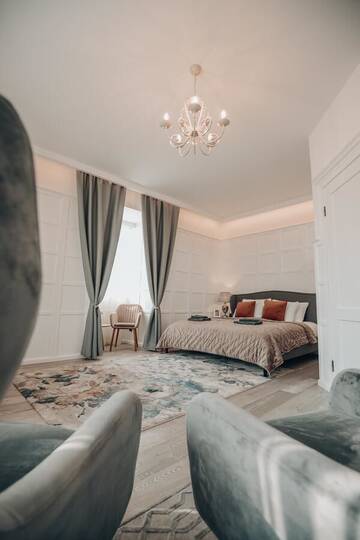 Фото номера Люкс с кроватью размера «king-size» и балконом Отель Bahnhofs hotel г. Алуксне 2