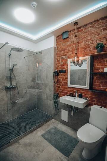 Фото номера Люкс с кроватью размера «king-size» и балконом Отель Bahnhofs hotel г. Алуксне 9