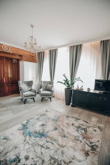Фото номера Люкс с кроватью размера «king-size» и балконом Отель Bahnhofs hotel г. Алуксне 4
