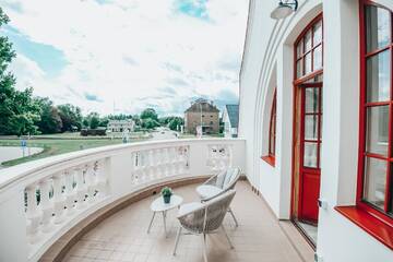 Фото номера Люкс с кроватью размера «king-size» и балконом Отель Bahnhofs hotel г. Алуксне 8